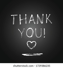 Thank you text on a chalk board. Chalk lettering of gratitude phrase. Thank you words on a blackboard with chalk heart. 