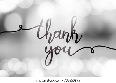 thank you, vector lettering on blurred lights background