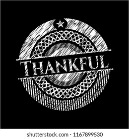 Thankful chalk emblem written on a blackboard