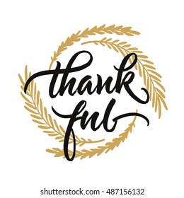 Thankful handwritten lettering. Thanksgiving greeting card with autumn leaves wreath.