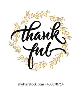 Thankful handwritten lettering. Thanksgiving greeting card with autumn leaves wreath.