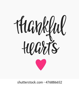Thankful Hearts Thanksgiving day simple lettering. Calligraphy postcard or poster graphic design lettering element. Hand written style postcard design. Photography overlay sign detail.