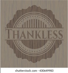 Thankless badge with wooden background