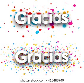 Thanks paper banners set with color drops, Spanish. Vector illustration.