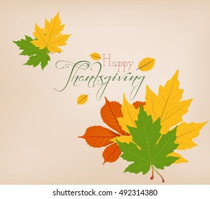 Thanksgiving Day. Colorful maples leaves and stylish text Give Thanks