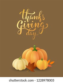 Thanksgiving day greeting card with golden handwritten lettering and pumpkins with leaves