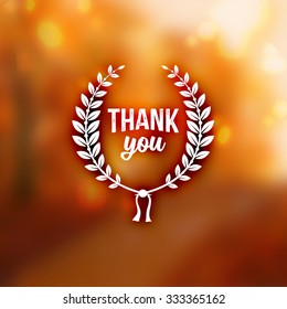 Thanksgiving Day Holiday Typographic Design. Calligraphic Elements. Blurred Autumn Forest Background.