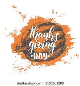 Thanksgiving day lettering calligraphy phrase. Autumn background with hand drawn pumpkin