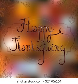 Thanksgiving greeting card with autumn foliage and blurred background. Based on hand drawn elements.