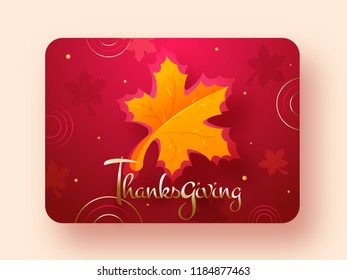 Thanksgiving greeting card design with lettering of Thanksgiving and maple leaf on abstract red background.