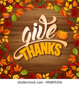 Thanksgiving greeting card with pumpkin, autumn leaves and calligraphy inscription Give Thanks. Rounded design on wooden background. Vector stock illustration.