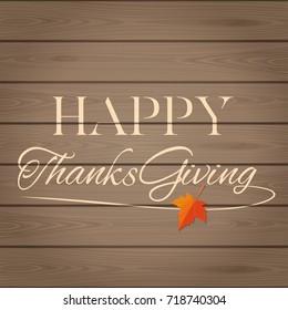 Thanksgiving lettering on a vintage wooden background. Lettering card for Thanksgiving Day. Vector illustration