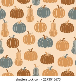 Thanksgiving seamless pattern. Pumpkins on a beige background. Harvest season. Happy Thanksgiving vector pattern. Fall pattern. Autumn design for fabric, paper, cover, interior decor.