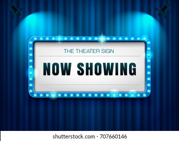 theater sign on curtain with spotlight