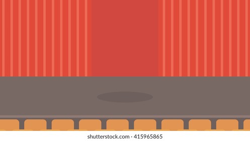 Theater stage with curtains, seats and spotlight.