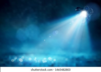 Theatrical spotlight illuminating the empty space of the stage. Blue background. Vector illustration.