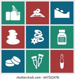 Therapy icons set. set of 9 therapy filled icons such as spa stones, woman in spa, spa stone, tablet, pipette, medical ampoule, injured finger