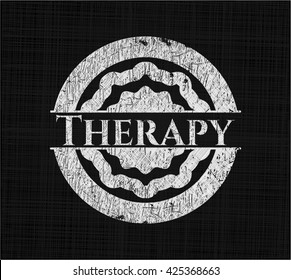 Therapy written on a blackboard