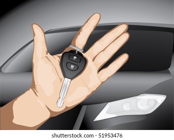 There is a car key in the hand against the car background.