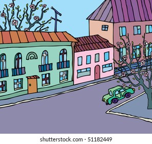 There is a car on the road in the town
