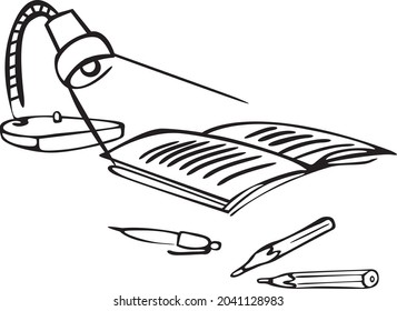 There is a lamp on the desk and it is lit. Next to a notebook spread out and scattered pen and pencils
