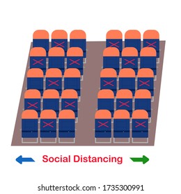 There are many seats in cabin of airplane and some seats have a red cross of symbol mean could not sit there. Social distancing in new normal. Covid-19 pandemic.
