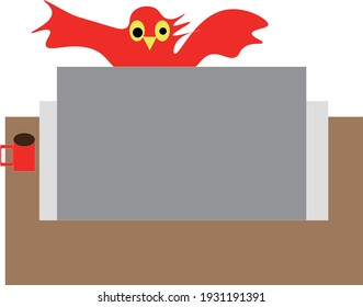 There is a parrot in front of the computer in my office