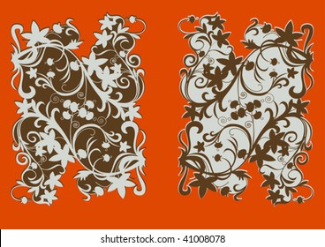There are  two corner decorative elements and plant  like motif