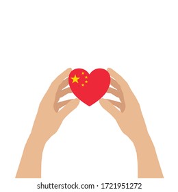 There are two hands holding a heart carefully isolated on white background. The heart is contained China flag inside. Concept about love, care and hopefully.