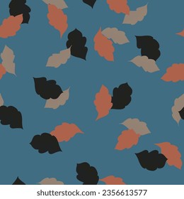 These fall leaf silhouettes are scattered across a dusty blue background creating a seamless vector repeat pattern design.