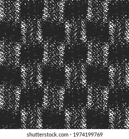 Thick fabric texture. Old wool blanket with a checkered pattern. Graphics in black and white.