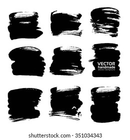 Thick strokes of black paint isolated on white background