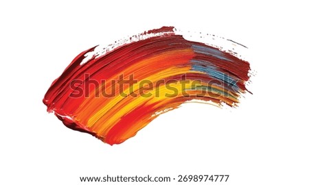Thick textured brush stroke paint smear in vibrant red orange yellow and blue hues on a white background