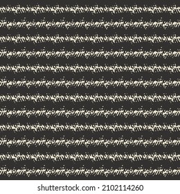 Thick wool or jute fabric with black and white stripes. Rough blanket texture.