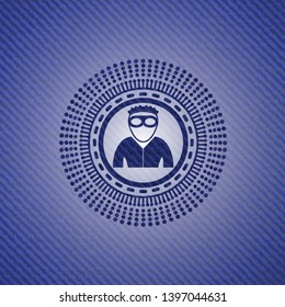 thief icon inside badge with denim background