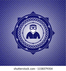 thief icon inside badge with jean texture