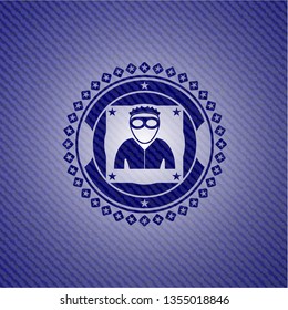 thief icon inside badge with jean texture