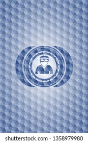 thief icon inside blue hexagon emblem.
