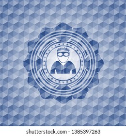 thief icon inside blue hexagon emblem.