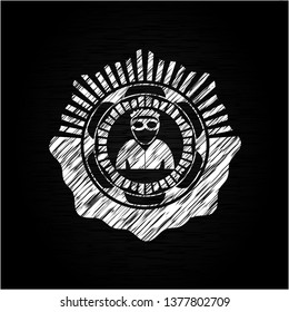 thief icon inside chalkboard emblem