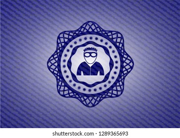 thief icon inside denim background