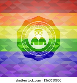 thief icon inside emblem on mosaic background with the colors of the LGBT flag