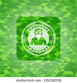 thief icon inside green emblem with mosaic ecological style background