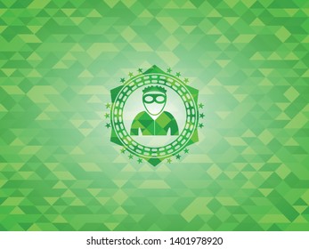 thief icon inside green emblem with triangle mosaic background