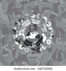 thief icon inside grey camo emblem