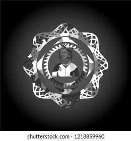 thief icon inside grey camouflage emblem