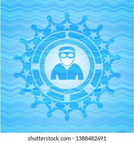 thief icon inside light blue water style emblem.