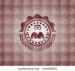 thief icon inside red seamless emblem with geometric pattern.