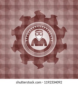 thief icon inside red seamless geometric emblem.