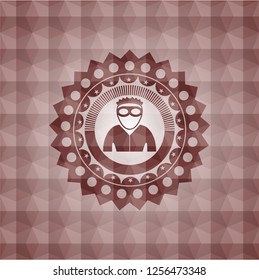 thief icon inside red seamless emblem or badge with geometric pattern background.